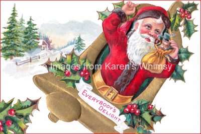 Pictures of Santa 5 - Santa in a Bell with a Kitten