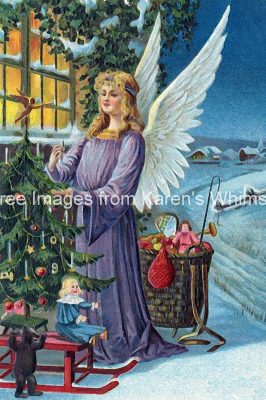 Christian Christmas Images 6 - Angel Decorates a Tree